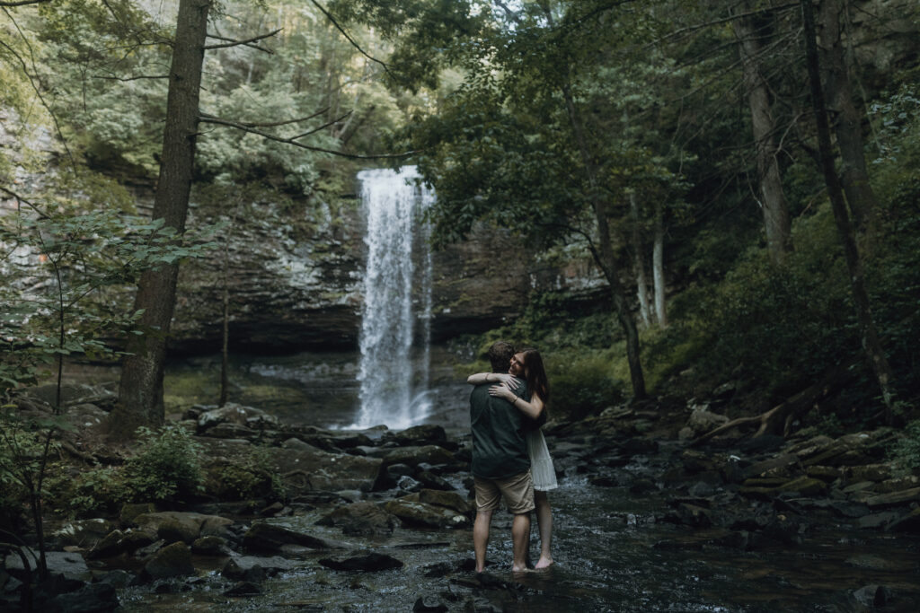 Couple in the waterfall at Cloudland Canyon State Park for the Engagement session