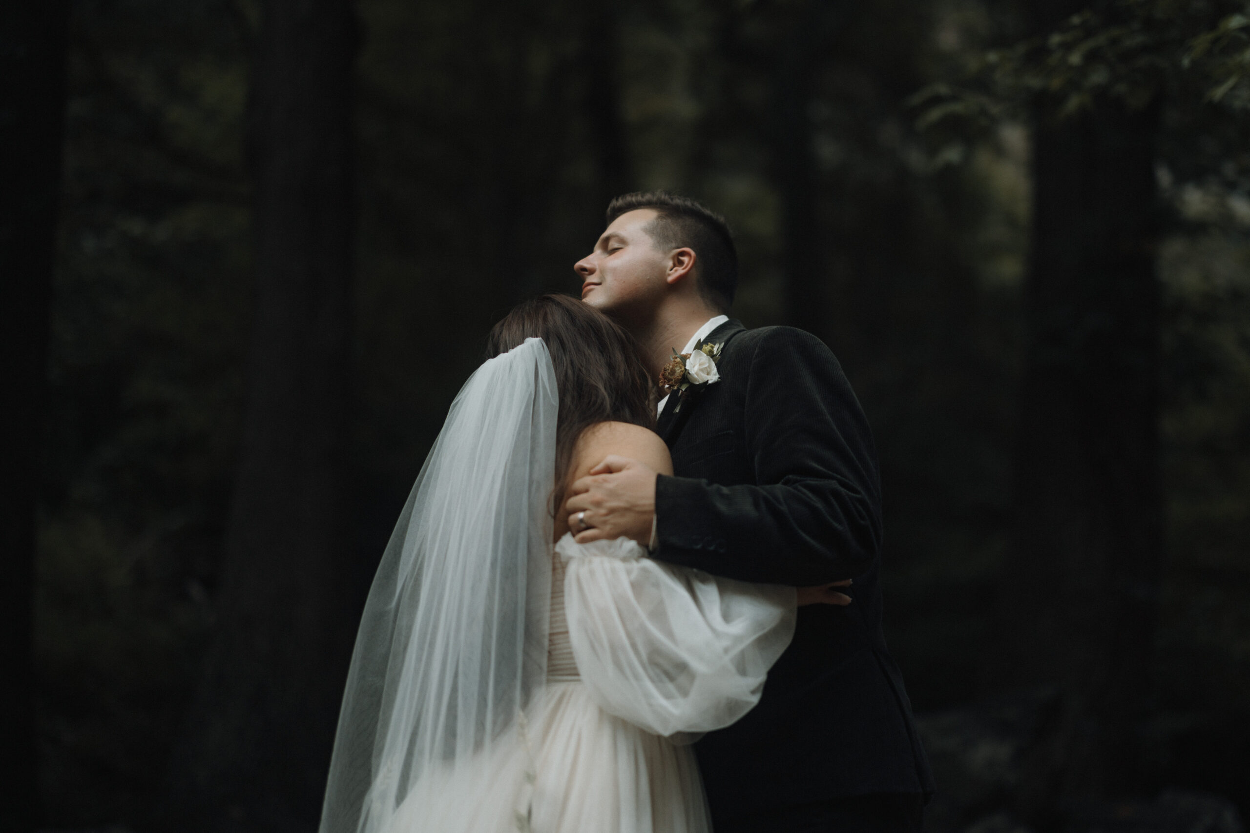 bride and groom embrace at an intimate wedding at Toccoa Falls