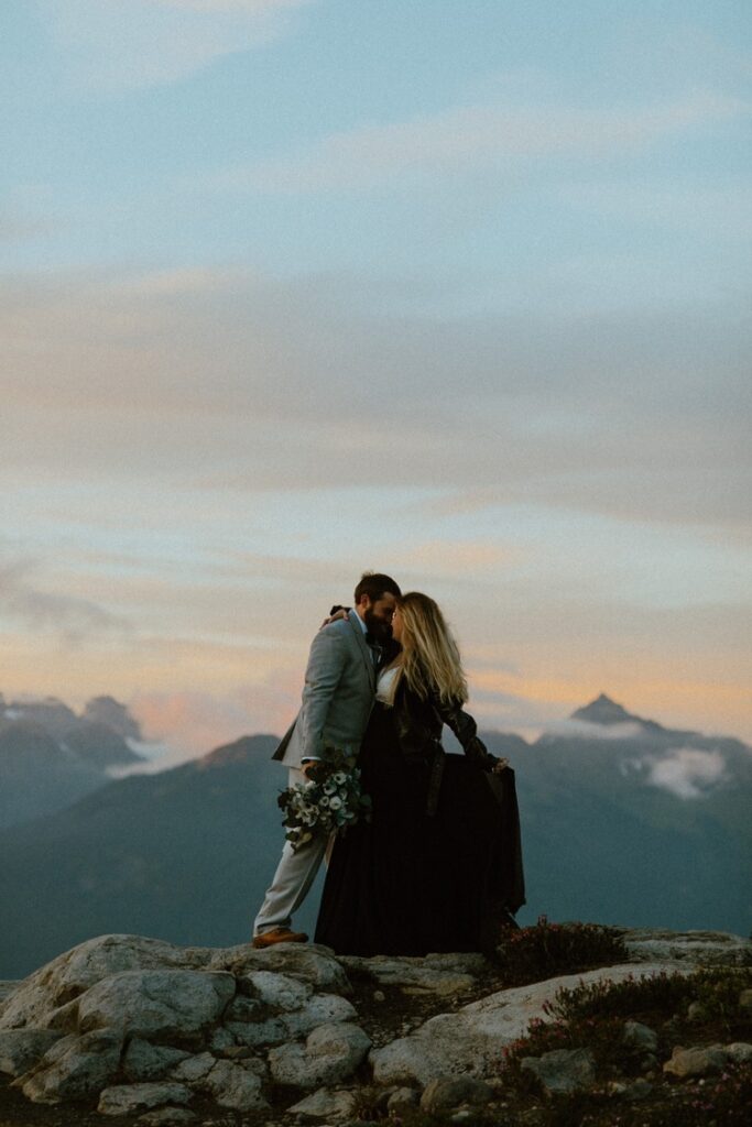 bride and groom elope on  mount baker in north cascades national park at sunset