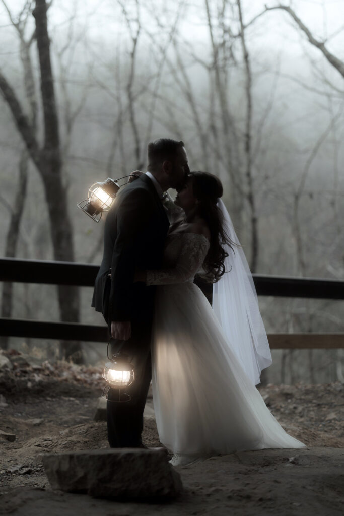 Couple walking along a forest trail during their Cloudland Canyon State Park elopement in winter
