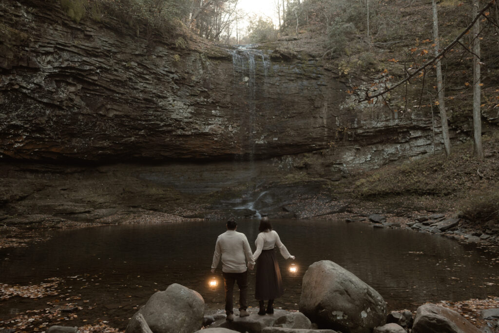 Moody fall engagement photos at Cloudland Canyon State Park with an engaged couple surrounded by autumn color.