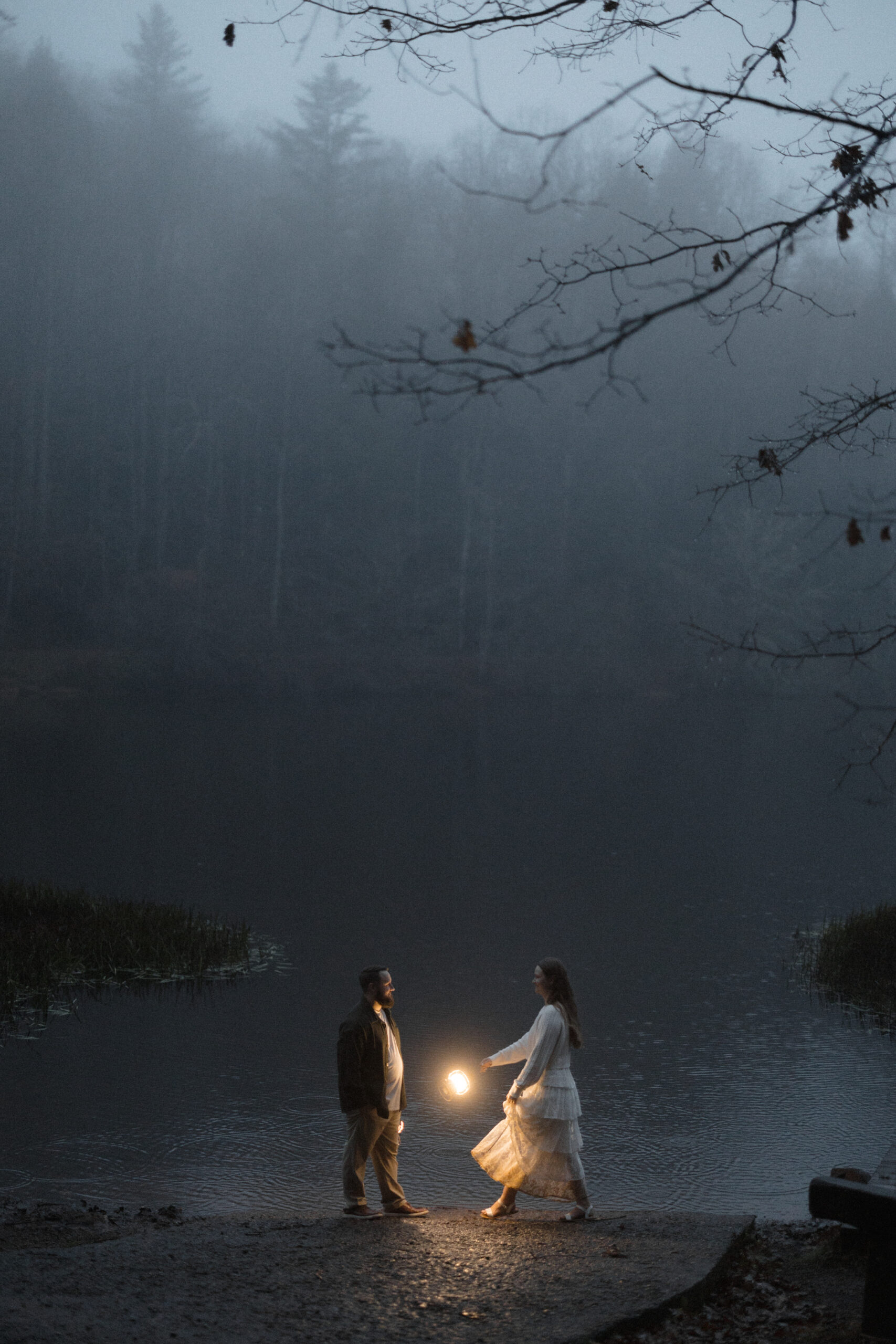 North Georgia engagement photographer at Lake Winfield Scott capturing authentic, moody, and romantic moments in rain, clouds, and fog.