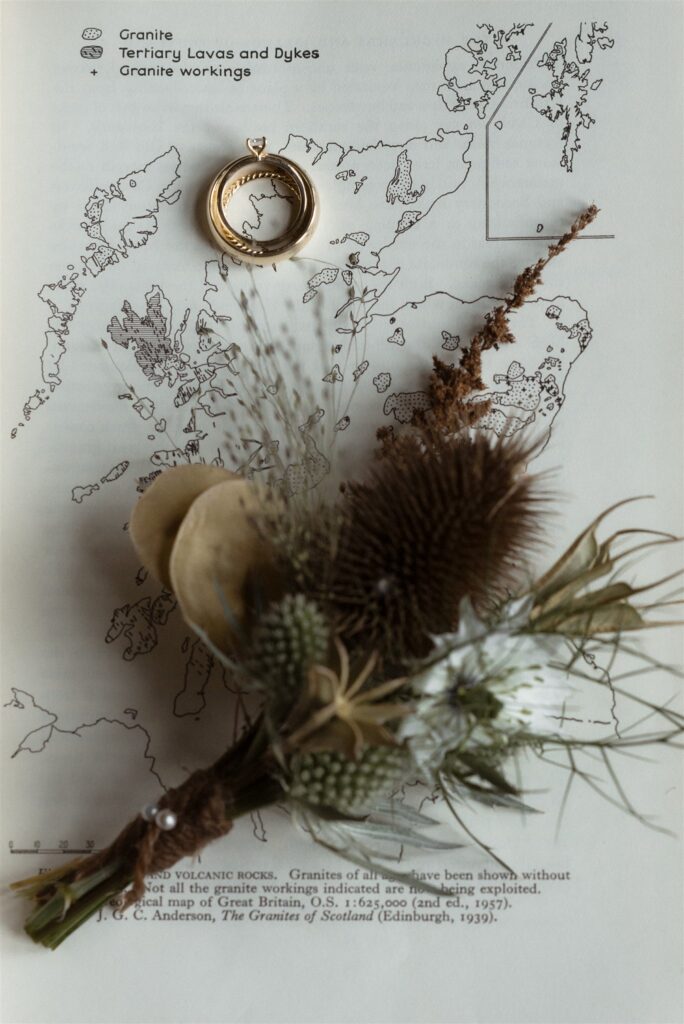 Moody, cinematic details from a Scotland destination wedding in the Scottish Highlands, embracing fog, rain, and outdoor scenery.