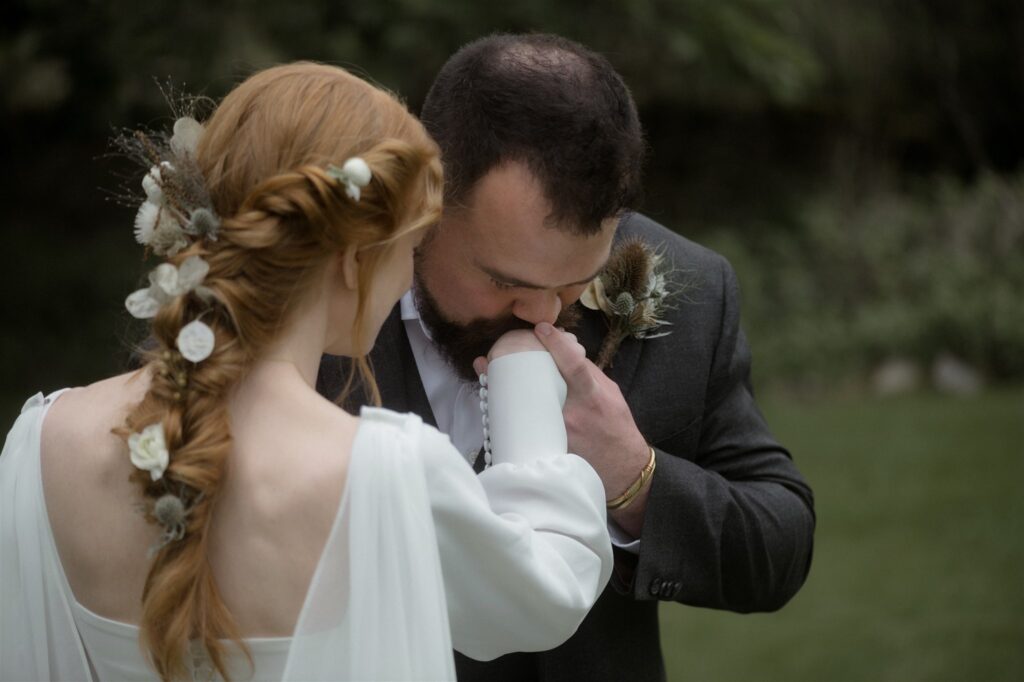 Bride and groom during an intimate Scotland destination wedding in the Scottish Highlands, captured with candid, cinematic wedding photography.
