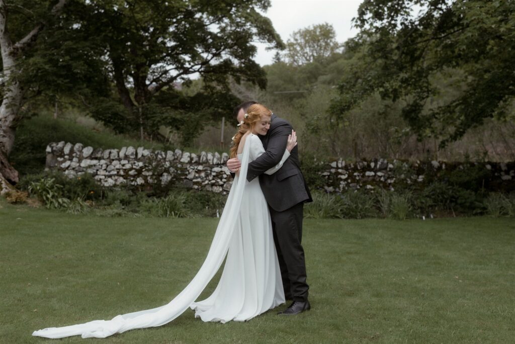 Bride and groom during an intimate Scotland destination wedding in the Scottish Highlands, captured with candid, cinematic wedding photography.