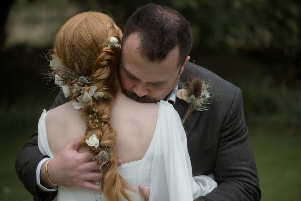 Bride and groom during an intimate Scotland destination wedding in the Scottish Highlands, captured with candid, cinematic wedding photography.