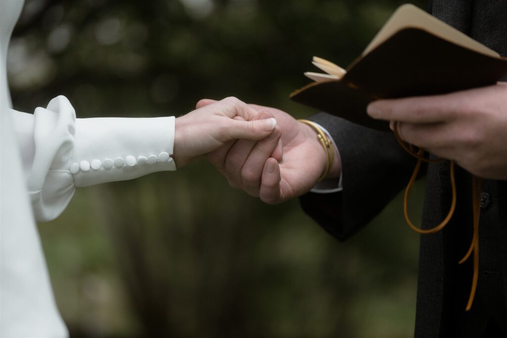 Bride and groom during an intimate Scotland destination wedding in the Scottish Highlands, captured with candid, cinematic wedding photography.