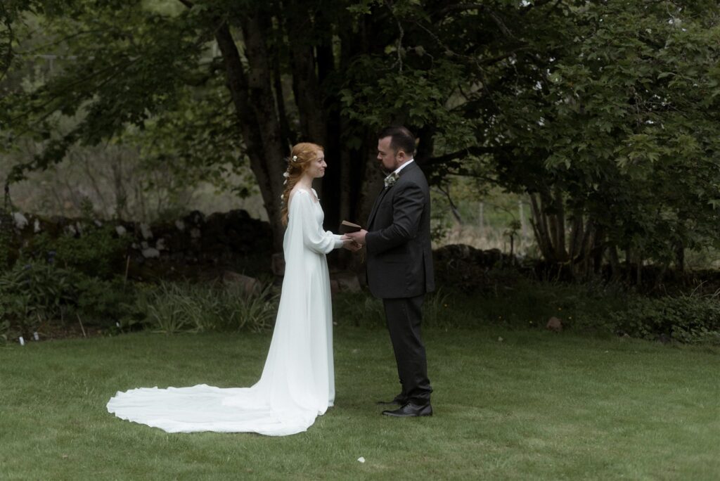 Bride and groom during an intimate Scotland destination wedding in the Scottish Highlands, captured with candid, cinematic wedding photography.