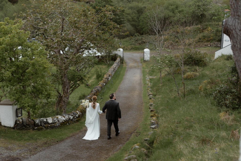 Bride and groom during an intimate Scotland destination wedding in the Scottish Highlands, captured with candid, cinematic wedding photography.