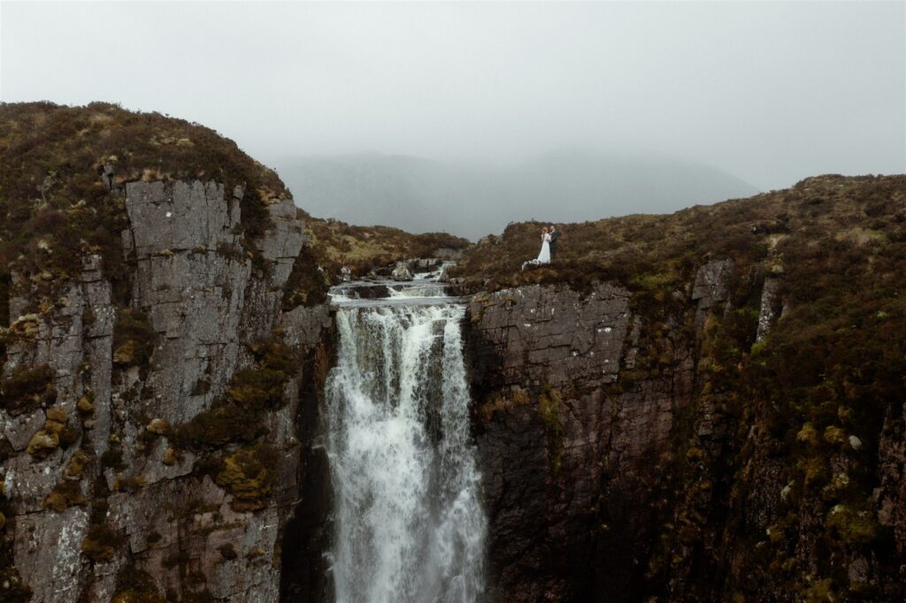 Bride and groom during an intimate Scotland destination wedding in the Scottish Highlands, captured with candid, cinematic wedding photography.