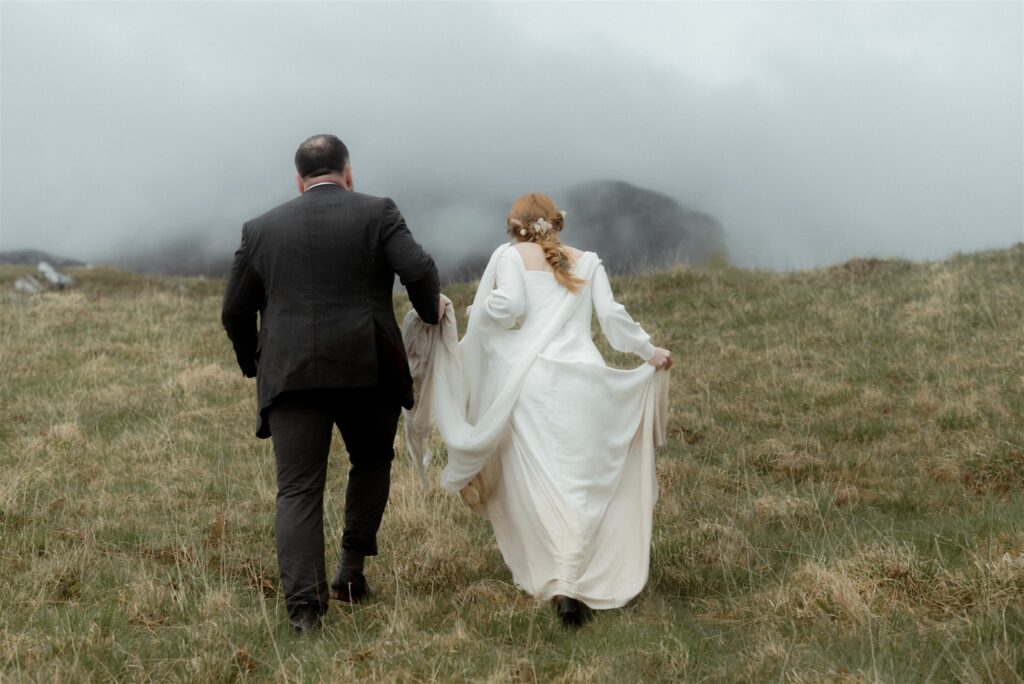 Bride and groom during an intimate Scotland destination wedding in the Scottish Highlands, captured with candid, cinematic wedding photography.
