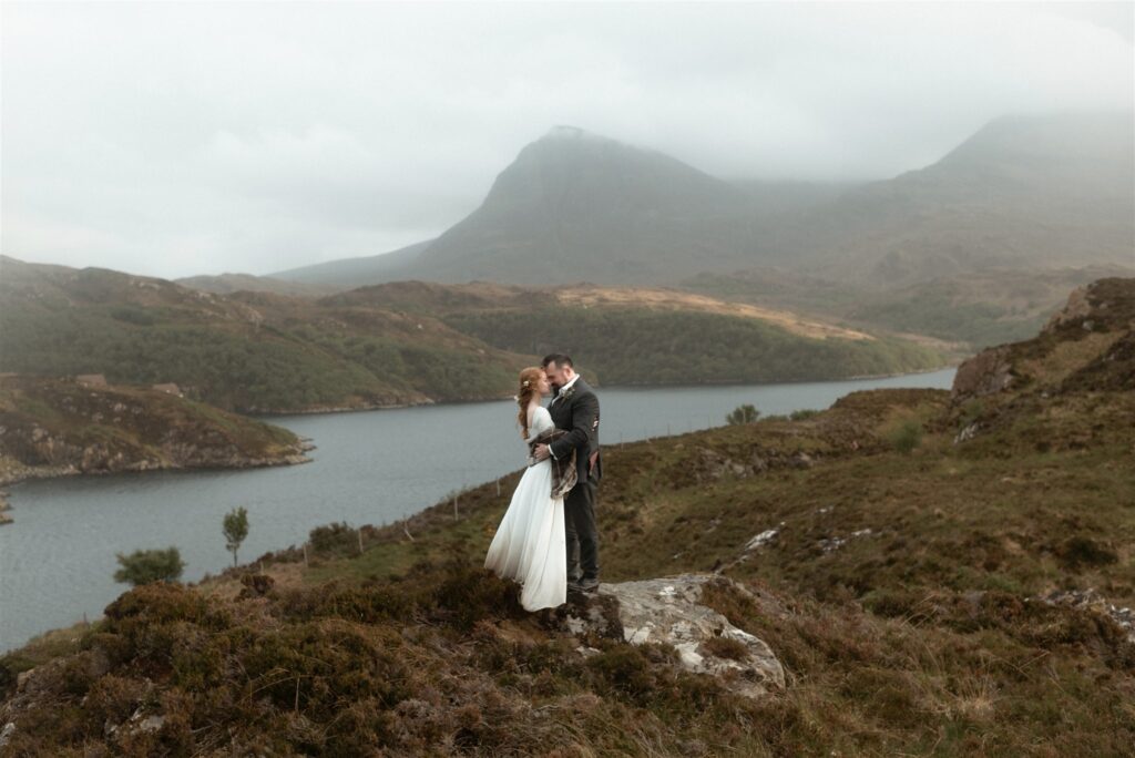 Bride and groom during an intimate Scotland destination wedding in the Scottish Highlands, captured with candid, cinematic wedding photography.