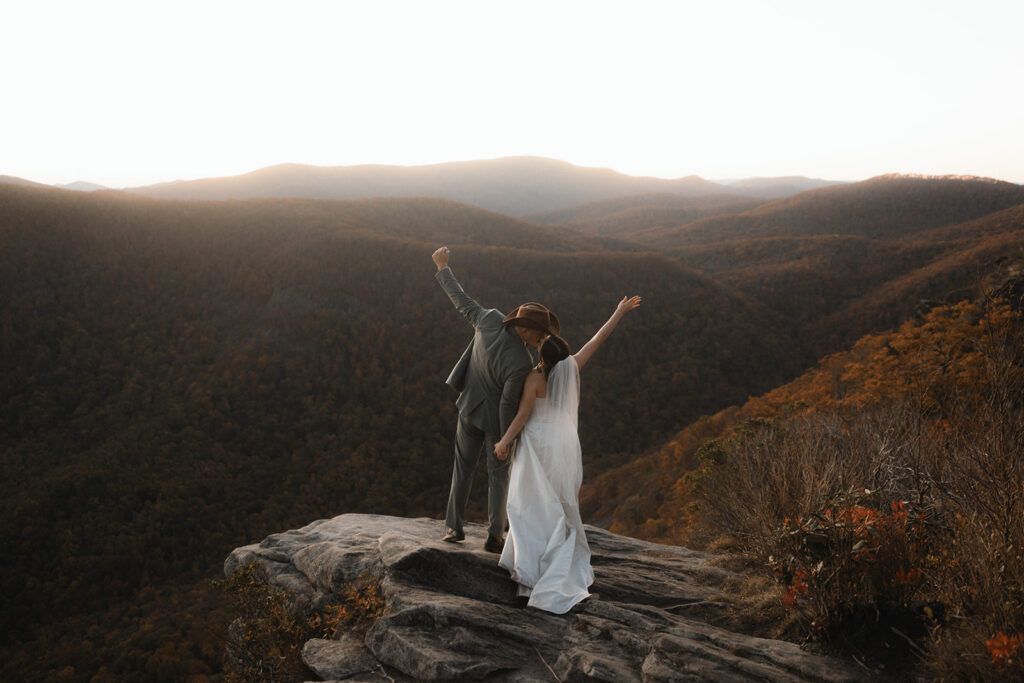 Wide view of Blue Ridge Parkway mountains in peak fall colors during an Asheville mountain elopement
