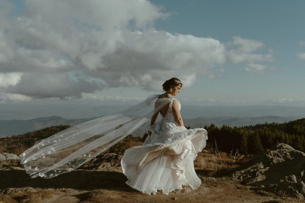Golden hour light over lush summer mountains during an intimate blue ridge parkway elopement