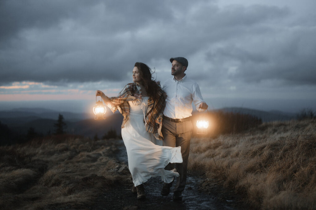 Cinematic portrait of couple in soft fog during an intimate Asheville mountain elopement ceremony