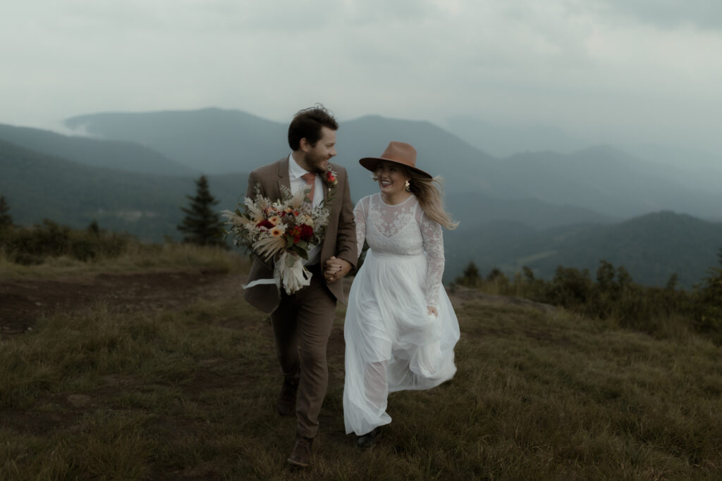 Golden hour light over lush summer mountains during an intimate roan mountain elopement