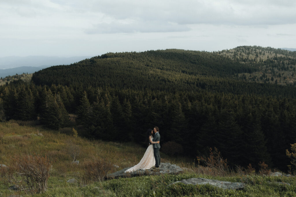 Golden hour light over lush summer mountains during an intimate Blue Ridge Parkway elopement
